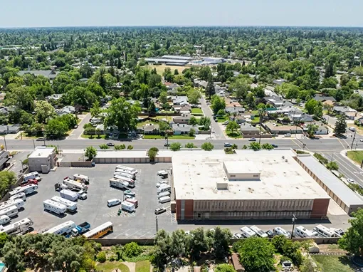 Aerial view of Devon Self Storage facility with RV and vehicle storage in residential area